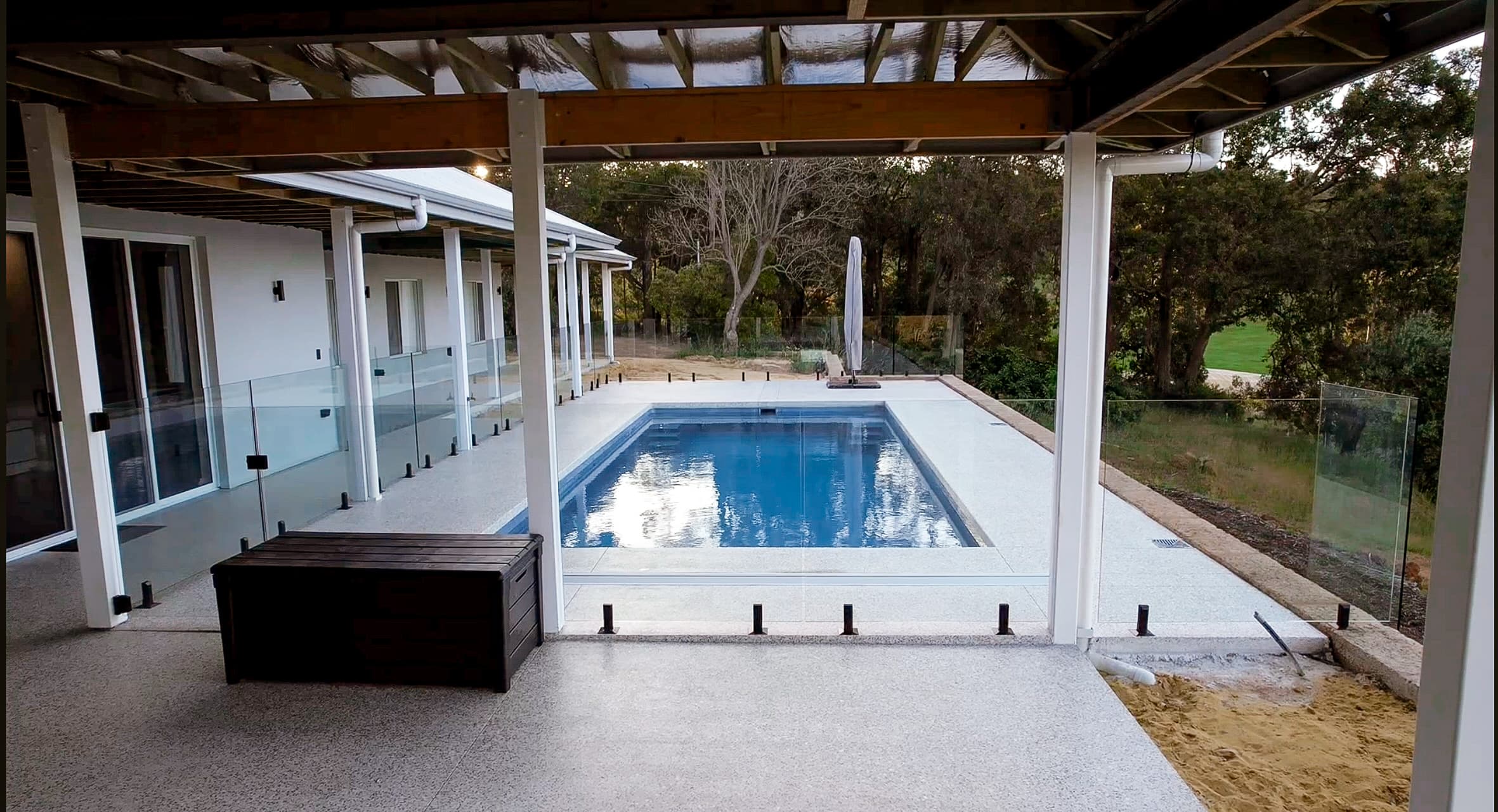 Modern pool installation with clear water